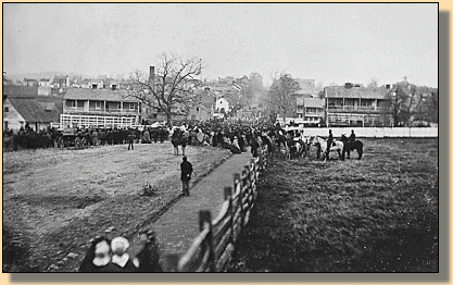 Regiment marching down a street